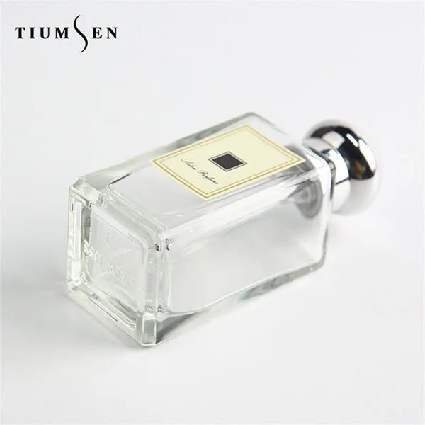 women's perfume in purple bottle