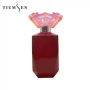 Frasco de perfume de cor vermelha